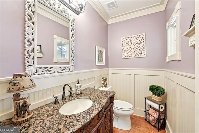44 Sassafras Rdg, Big Canoe, GA 30143 - half bathroom featuring ornamental molding, vanity, wainscoting, wood finished floors, and a decorative wall