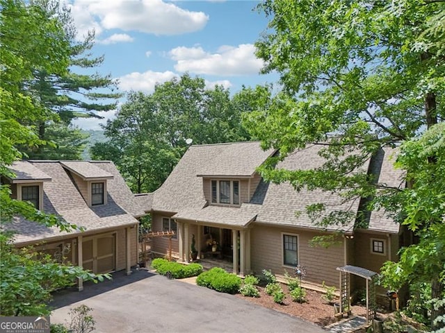 44 Sassafras Rdg, Big Canoe, GA 30143 - view of front facade with a shingled roof and driveway