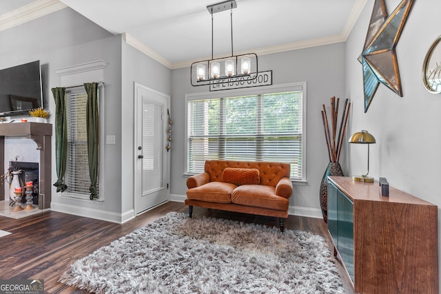 300 Bridgehampton Way, Perry, GA 31069 - living area with wood finished floors, crown molding, and a chandelier