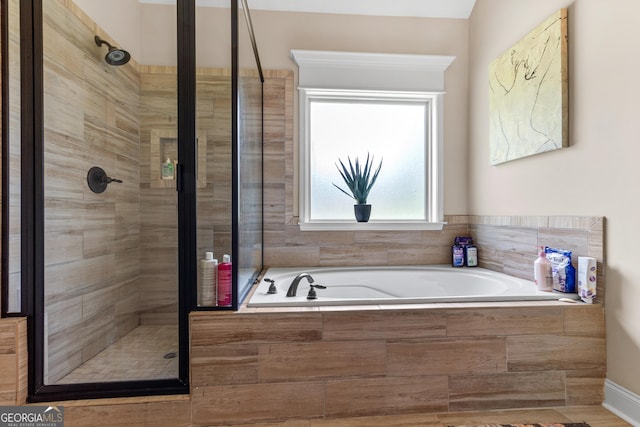 300 Bridgehampton Way, Perry, GA 31069 - full bathroom featuring a stall shower and a bath