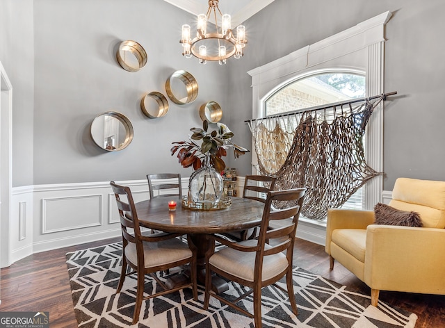 300 Bridgehampton Way, Perry, GA 31069 - dining room with a chandelier, wood finished floors, wainscoting, and a decorative wall