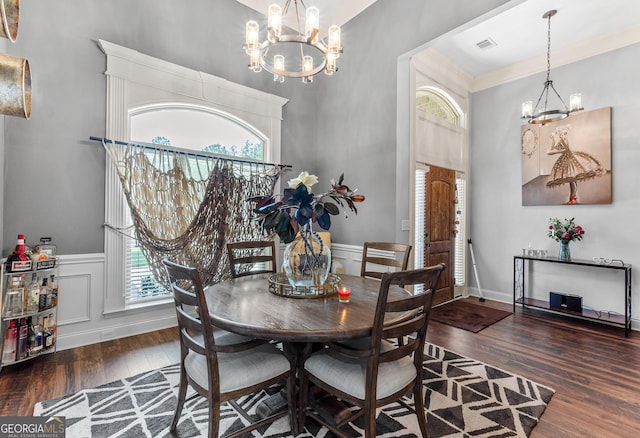 300 Bridgehampton Way, Perry, GA 31069 - dining room featuring a chandelier, wood finished floors, a high ceiling, and ornamental molding