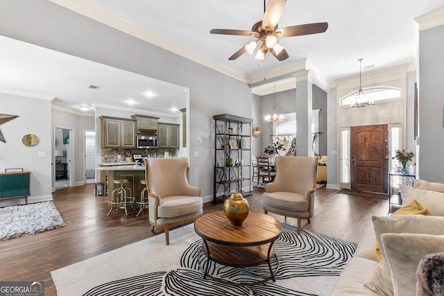 300 Bridgehampton Way, Perry, GA 31069 - living area featuring a chandelier, ceiling fan, wood finished floors, crown molding, and recessed lighting