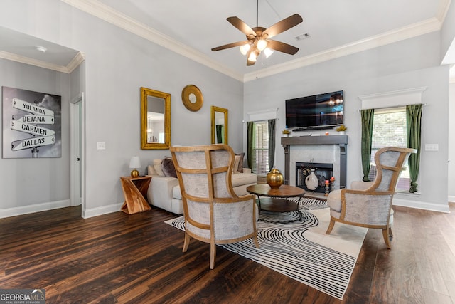 300 Bridgehampton Way, Perry, GA 31069 - living area with hardwood / wood-style flooring, ceiling fan, a fireplace, and crown molding