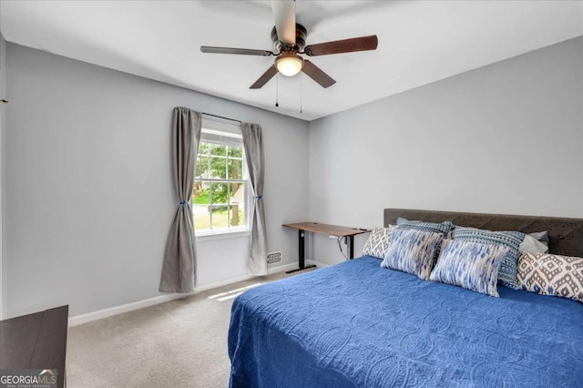 425 Shelby Ln, Hiram, GA 30141 - carpeted bedroom featuring baseboards and ceiling fan