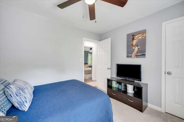 425 Shelby Ln, Hiram, GA 30141 - bedroom featuring light colored carpet and ceiling fan