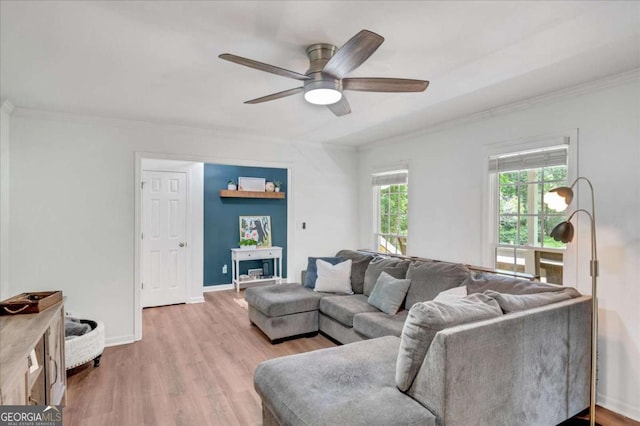 425 Shelby Ln, Hiram, GA 30141 - living area with ornamental molding, ceiling fan, and light wood-style flooring