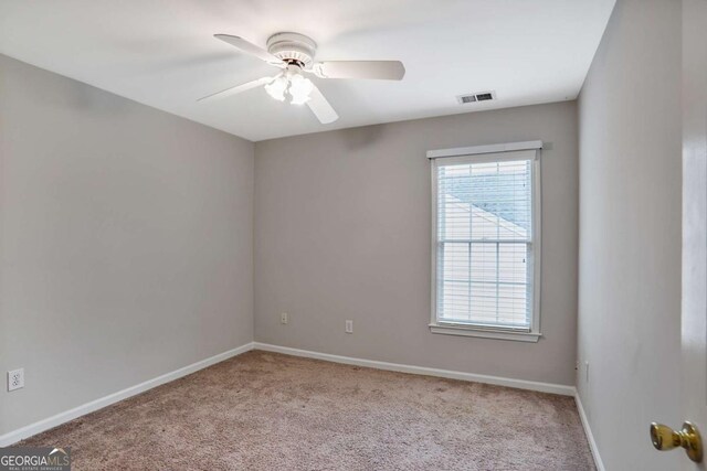 845 Melbourne Trl, Alpharetta, GA 30009 - carpeted spare room featuring a ceiling fan and baseboards
