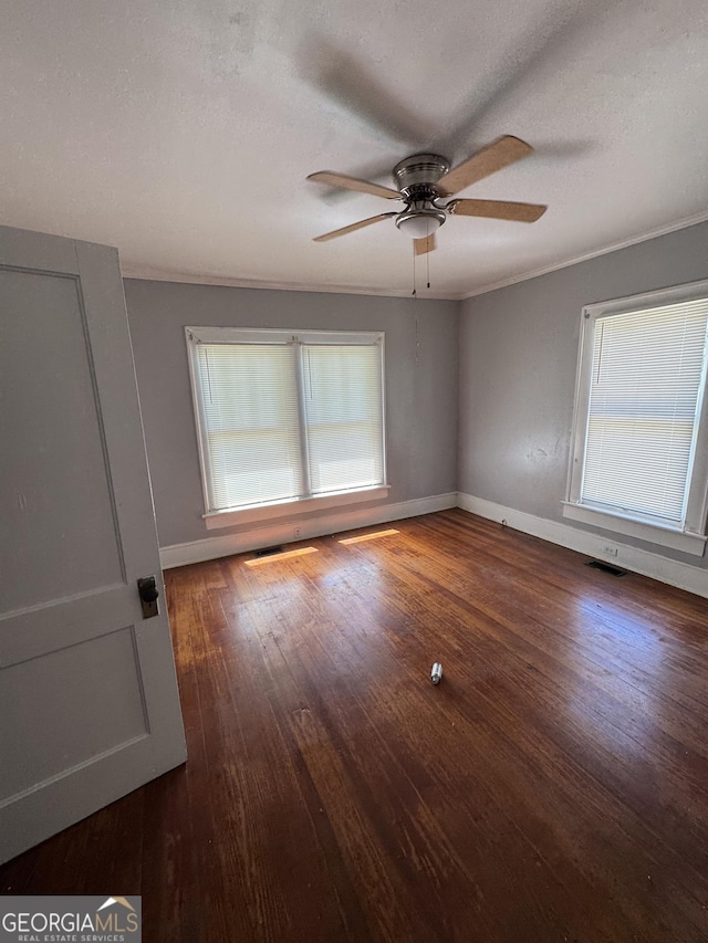 1182 Brentwood Ave, Macon, GA 31204 - empty room with a ceiling fan, wood finished floors, and a textured ceiling