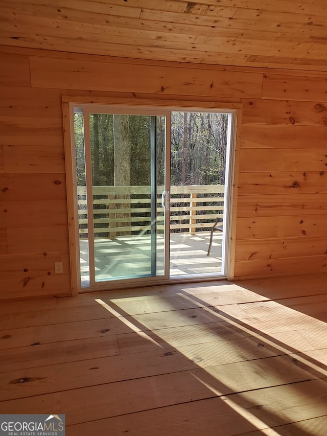 282 Armor Way, Ellijay, GA 30540 - doorway featuring wooden walls and hardwood / wood-style floors