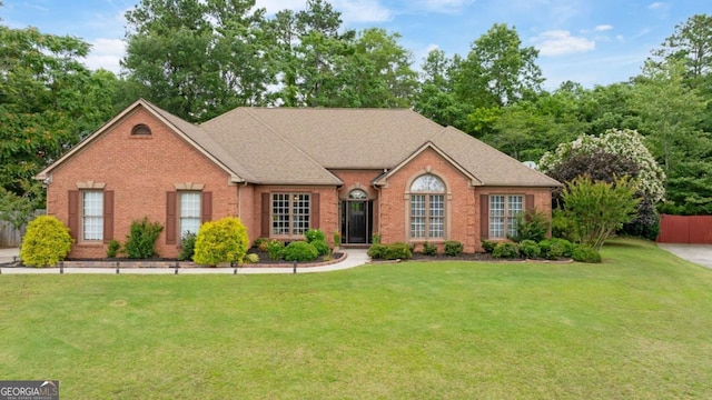 425 Starfire Ct, Suwanee, GA 30024 - view of front of property with brick siding and a shingled roof