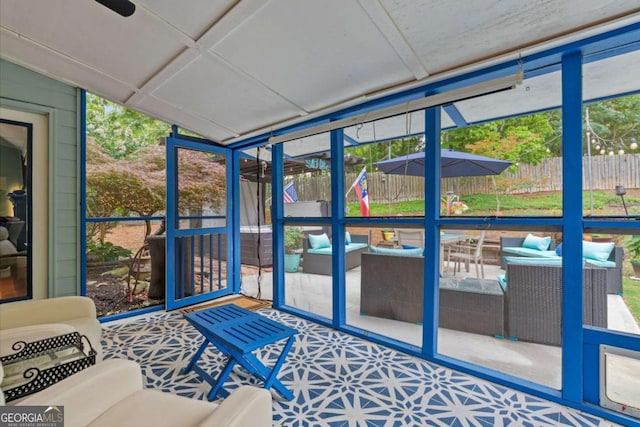 425 Starfire Ct, Suwanee, GA 30024 - sunroom / solarium featuring healthy amount of natural light, a ceiling fan, and lofted ceiling
