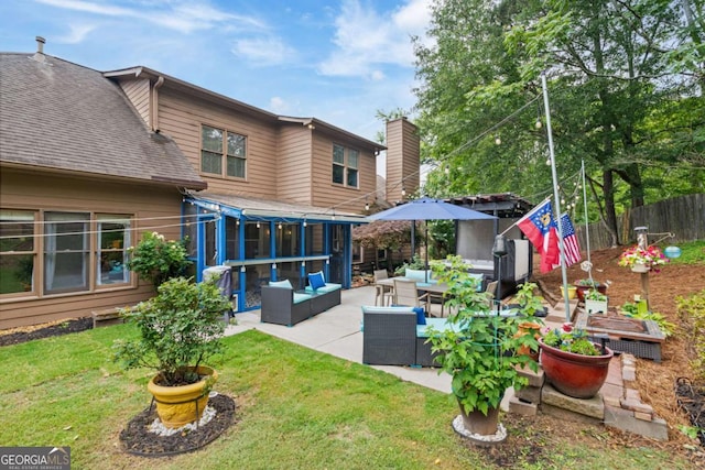 425 Starfire Ct, Suwanee, GA 30024 - rear view of property with roof with shingles, a patio, an outdoor living space, and a chimney