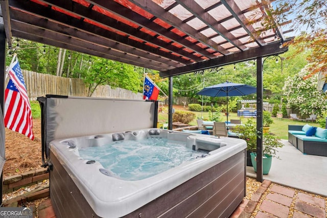 425 Starfire Ct, Suwanee, GA 30024 - fenced backyard with a hot tub and outdoor lounge area
