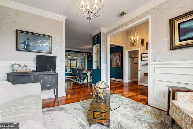 425 Starfire Ct, Suwanee, GA 30024 - living room featuring a chandelier, crown molding, and wood finished floors