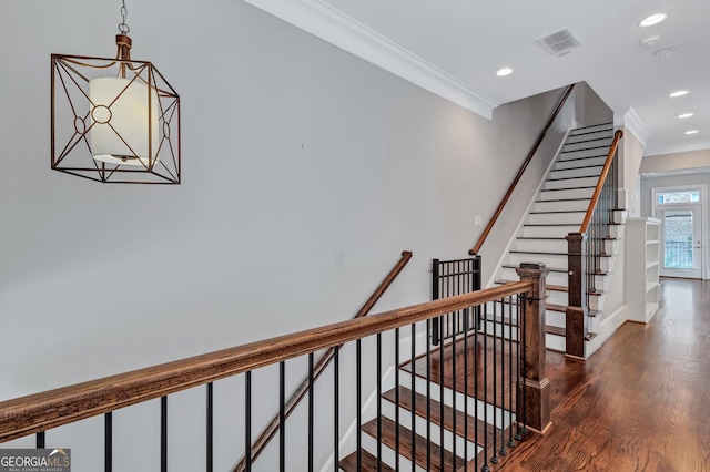 326 Brownstones Cir NE, Atlanta, GA 30312 - stairs featuring crown molding, wood finished floors, and recessed lighting