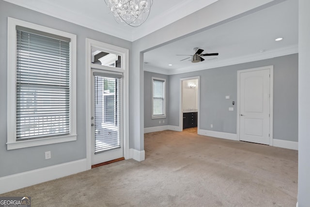 326 Brownstones Cir NE, Atlanta, GA 30312 - carpeted empty room with crown molding, a chandelier, ceiling fan, and recessed lighting