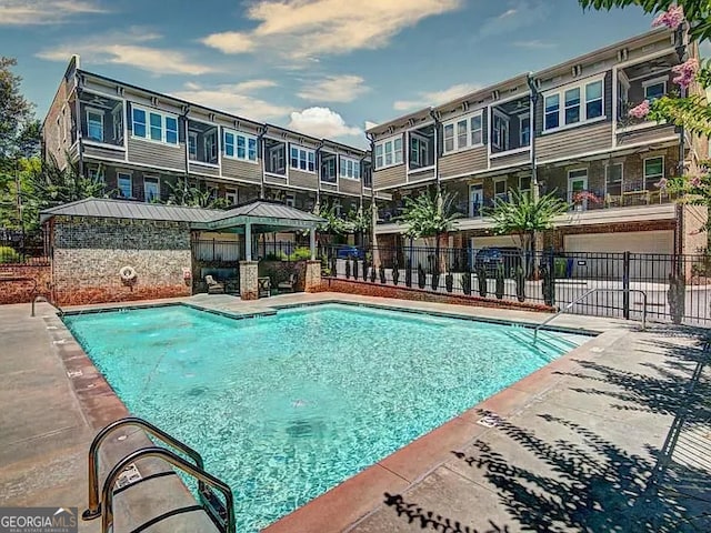 326 Brownstones Cir NE, Atlanta, GA 30312 - community pool featuring a gazebo and a patio