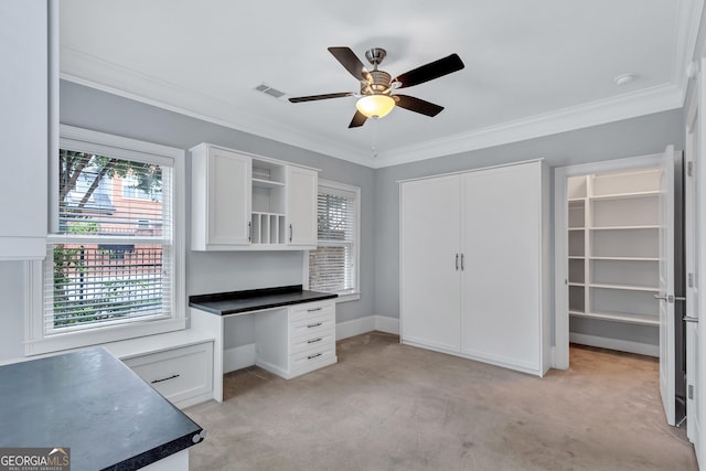 326 Brownstones Cir NE, Atlanta, GA 30312 - unfurnished office featuring a ceiling fan, light carpet, ornamental molding, and built in study area
