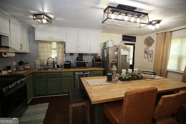 3227 Due W Rd, Dallas, GA 30157 - kitchen featuring wood counters, stainless steel appliances, and tasteful backsplash