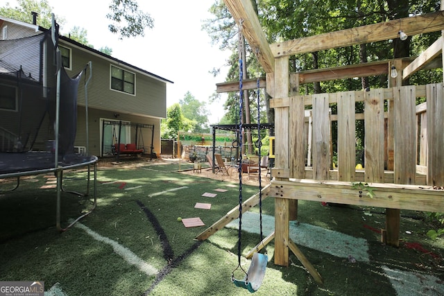 3227 Due W Rd, Dallas, GA 30157 - view of yard featuring a trampoline