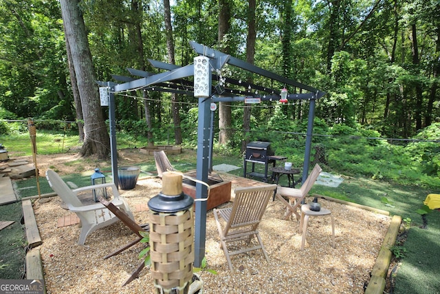 3227 Due W Rd, Dallas, GA 30157 - view of yard featuring a forest view