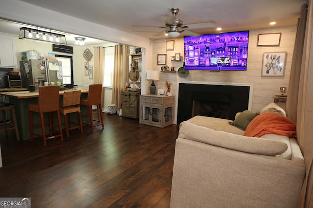 3227 Due W Rd, Dallas, GA 30157 - living area featuring dark wood finished floors, a fireplace, a ceiling fan, and recessed lighting