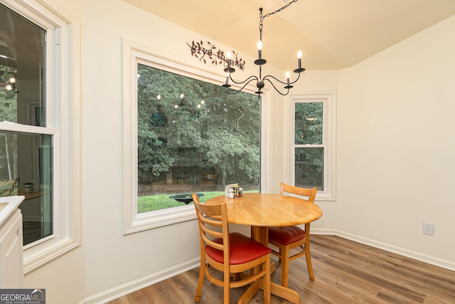 7140 Timberbrooke Dr, Gainesville, GA 30506 - dining area featuring a chandelier and wood finished floors