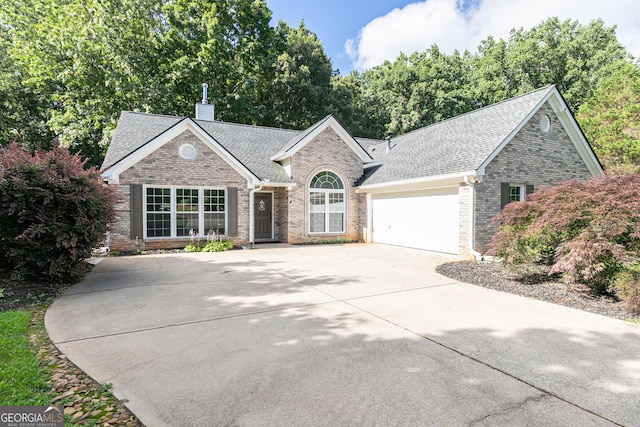 7140 Timberbrooke Dr, Gainesville, GA 30506 - single story home with brick siding, roof with shingles, an attached garage, and driveway