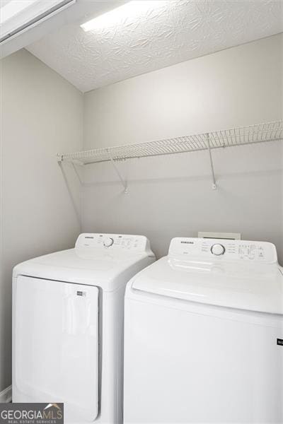 5667 Cascade, Atlanta, GA 30336 - laundry room featuring washer and clothes dryer