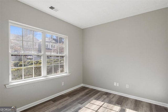 5667 Cascade, Atlanta, GA 30336 - spare room with wood finished floors and baseboards
