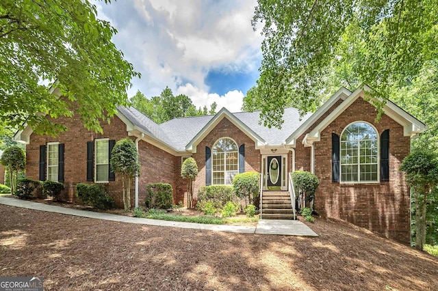 110 Chardonnay Oaks Dr, Mcdonough, GA 30252 - view of front of house with brick siding and roof with shingles