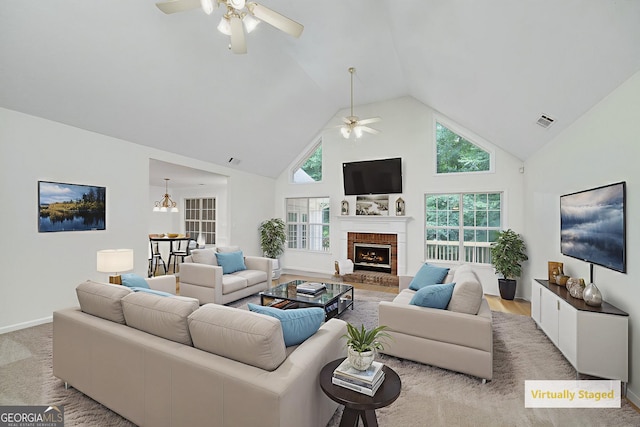 110 Chardonnay Oaks Dr, Mcdonough, GA 30252 - living room with ceiling fan, high vaulted ceiling, and a brick fireplace