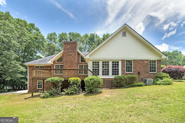 110 Chardonnay Oaks Dr, Mcdonough, GA 30252 - back of property with brick siding, a chimney, a yard, and a deck