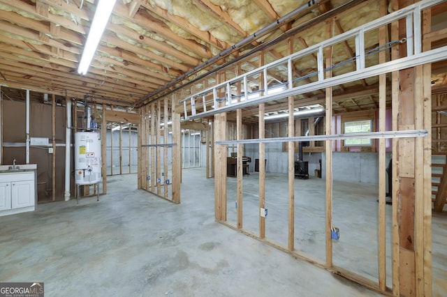 110 Chardonnay Oaks Dr, Mcdonough, GA 30252 - below grade area featuring water heater and a sink