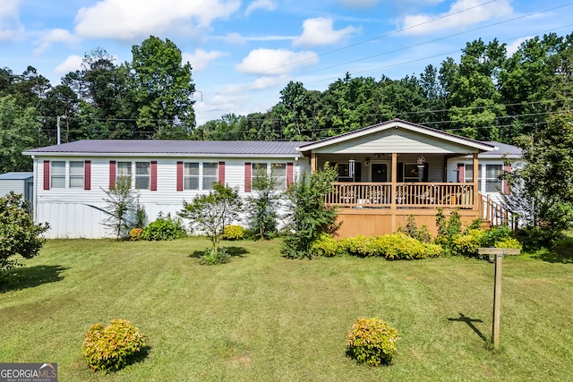 430 Williams Wilson Rd, Hull, GA 30646 - view of front of property featuring covered porch, a front lawn, and a metal roof
