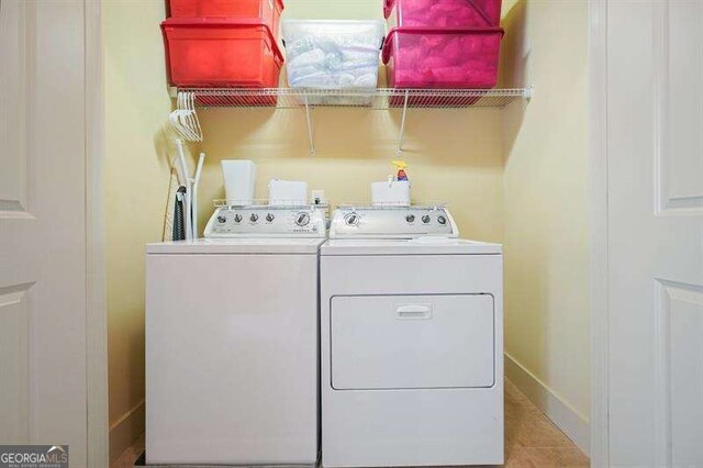 3202 Saute Way, Avondale Estates, GA 30002 - laundry room with washer and clothes dryer and tile patterned floors