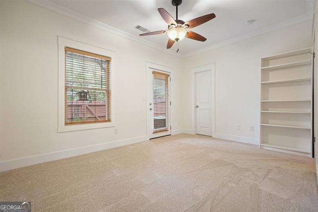 3202 Saute Way, Avondale Estates, GA 30002 - unfurnished bedroom featuring ornamental molding, light carpet, and ceiling fan