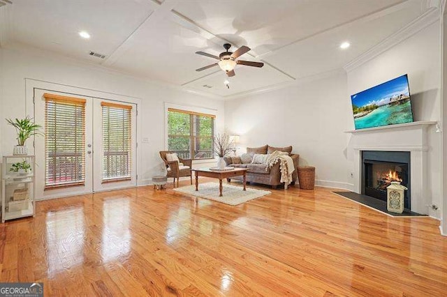 3202 Saute Way, Avondale Estates, GA 30002 - living room featuring french doors, ornamental molding, wood finished floors, a ceiling fan, and a fireplace with flush hearth