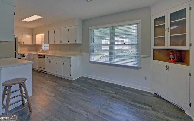 37 Cunningham Dr, Hartwell, GA 30643 - kitchen featuring dishwasher, white cabinets, dark wood-style floors, stainless steel electric range oven, and light countertops