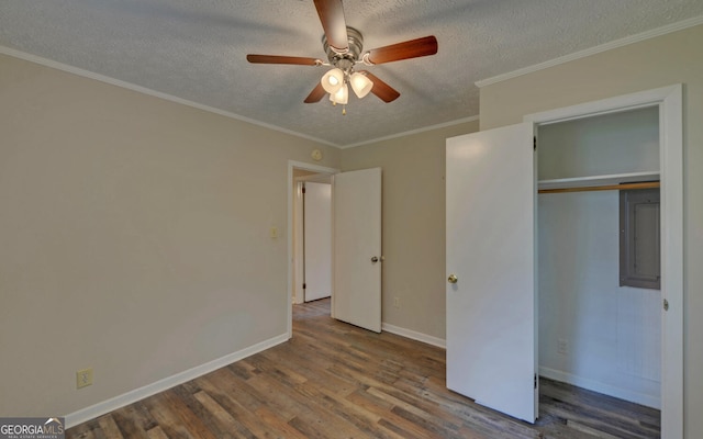 37 Cunningham Dr, Hartwell, GA 30643 - unfurnished bedroom with wood finished floors, a textured ceiling, electric panel, a closet, and ceiling fan