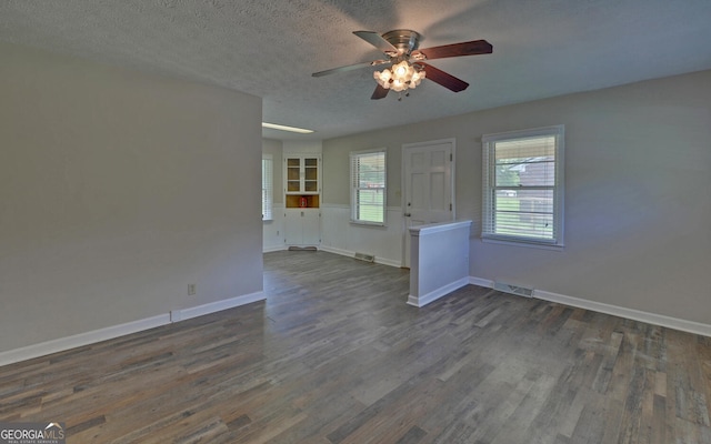 37 Cunningham Dr, Hartwell, GA 30643 - unfurnished room with ceiling fan, dark wood-type flooring, and a textured ceiling