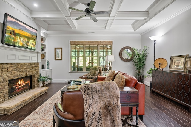 452 Rockford Pass, Marietta, GA 30064 - living area with dark wood-style floors, a ceiling fan, a stone fireplace, crown molding, and beam ceiling