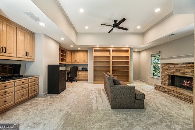 625 Wynfield Ct, Roswell, GA 30076 - living area with light carpet, ceiling fan, recessed lighting, built in study area, and ornamental molding