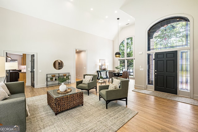 625 Wynfield Ct, Roswell, GA 30076 - living area with a high ceiling, light wood-type flooring, and recessed lighting