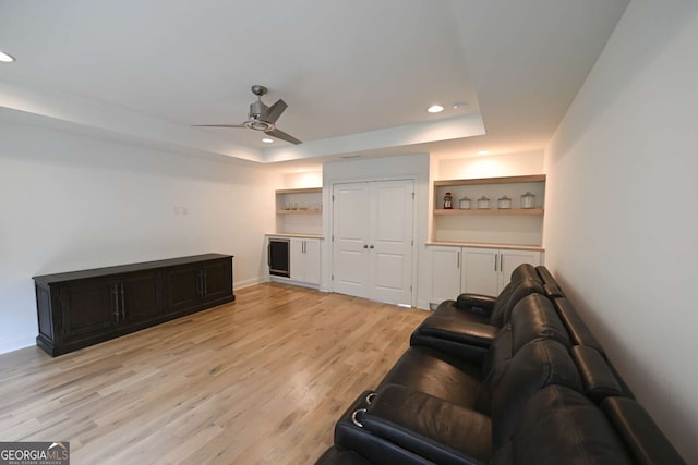 1895 Henley Way, Alpharetta, GA 30009 - living area with a tray ceiling, ceiling fan, recessed lighting, and light wood-type flooring
