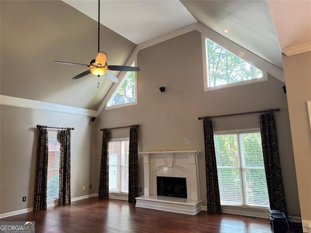 1464 Chatsworth Trce, Lawrenceville, GA 30044 - unfurnished living room featuring high vaulted ceiling, plenty of natural light, a ceiling fan, and a tile fireplace