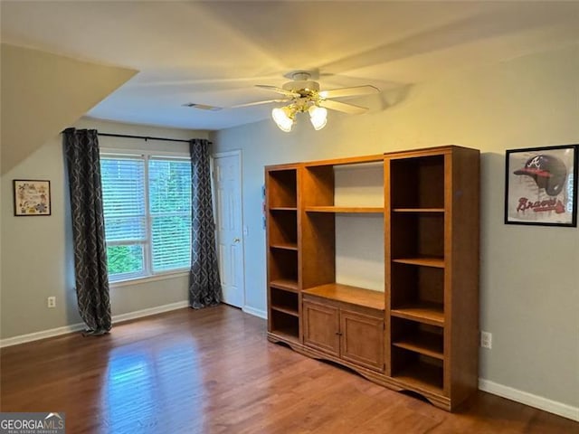 1464 Chatsworth Trce, Lawrenceville, GA 30044 - unfurnished bedroom with wood finished floors and a ceiling fan