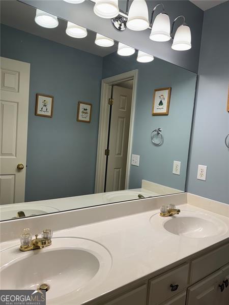 1464 Chatsworth Trce, Lawrenceville, GA 30044 - full bathroom with double vanity