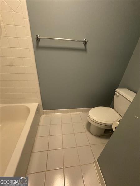 1464 Chatsworth Trce, Lawrenceville, GA 30044 - bathroom featuring tile patterned flooring, a tub, and a shower